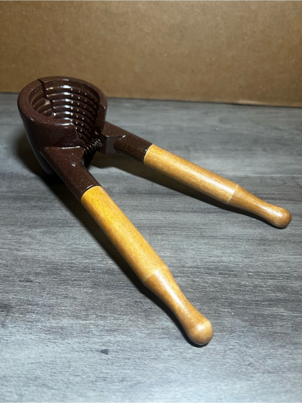 Vintage Dutch Modern MCM Brown Metal and Wood Nutcracker with Wooden Handles-